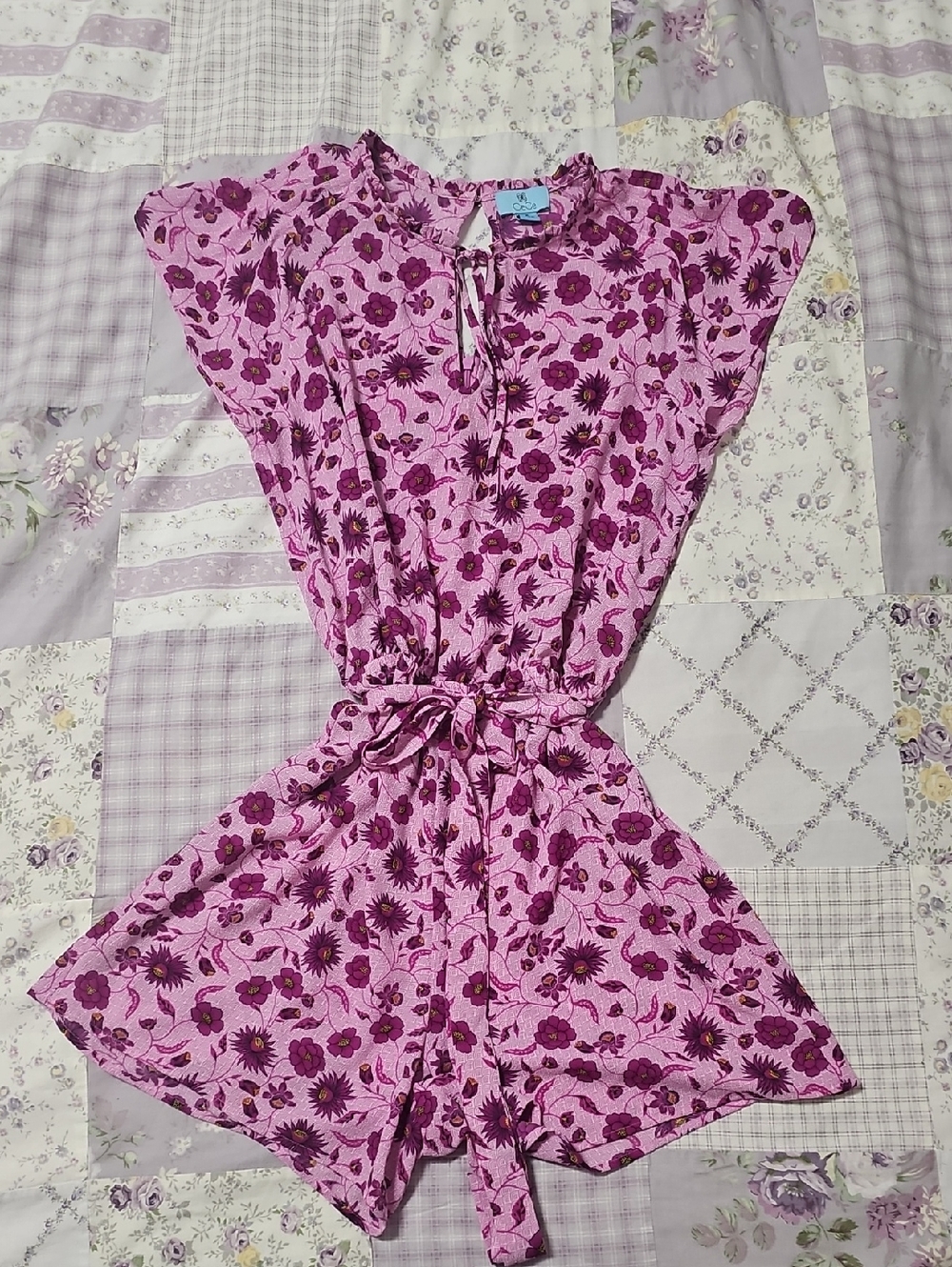 Cece Purple Floral Short Romper. Size M
